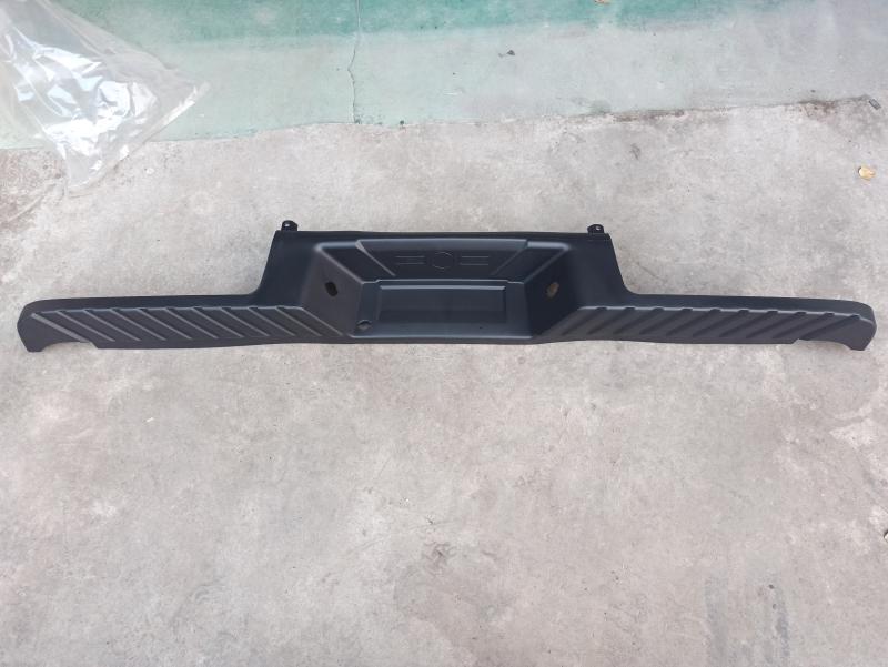 Rear bumper pedal