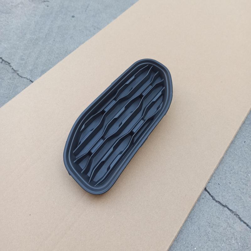 Front bumper tow hook cover