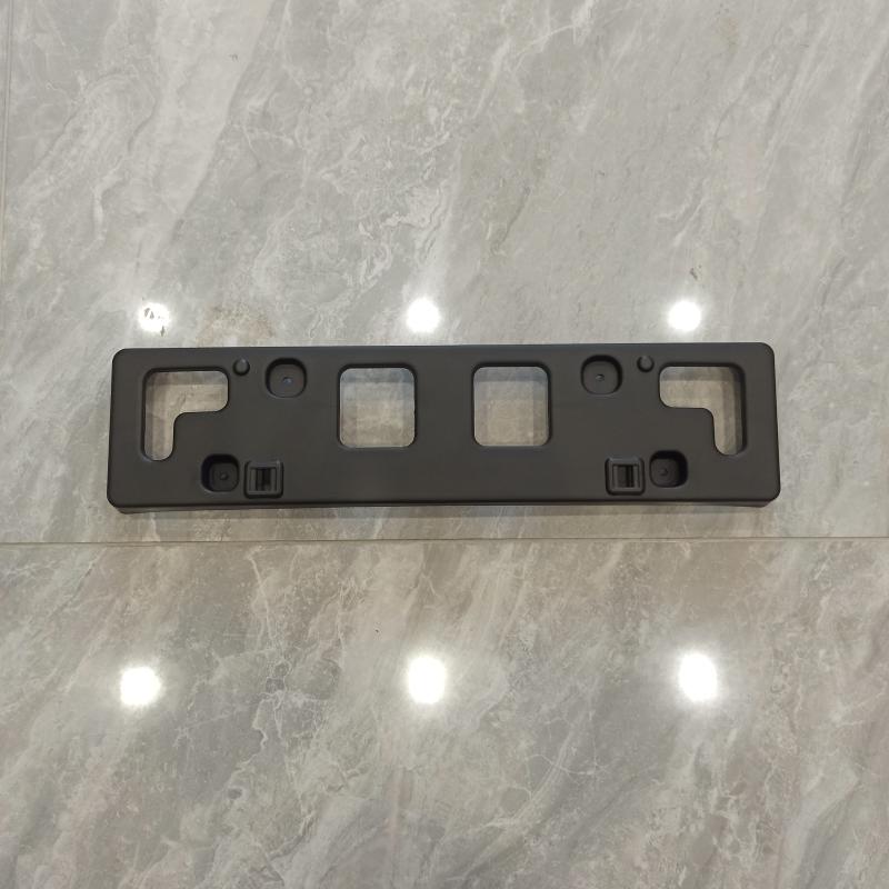 Front bumper license plate holder