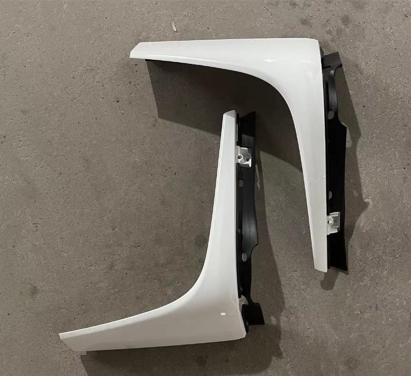 HEAD LAMP LOWER TRIM LH/RH