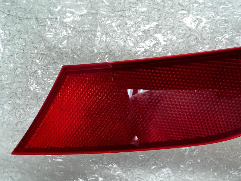Rear bumper reflector