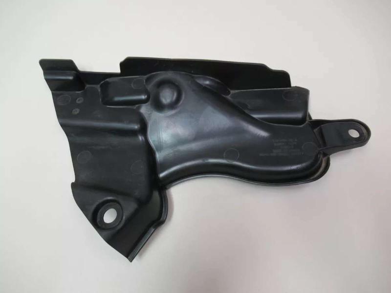 Front shock absorber cover plate-left