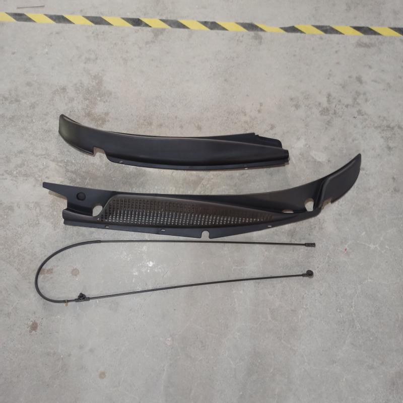 Windshield wiper grille trim panel cover.