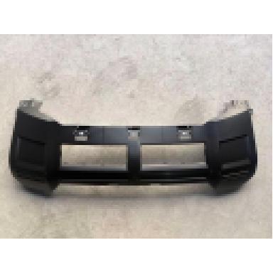 Body trim panel beneath the front bumper.