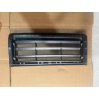 Front bumper left/right grille trim panel.