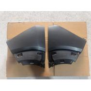 Front bumper left/right trim pieces.
