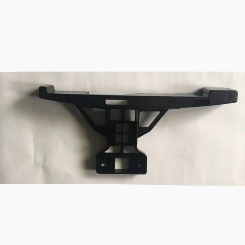 Mid-section support for the front bumper.