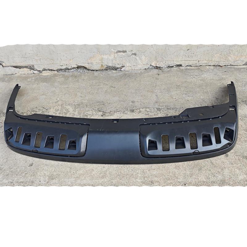 Rear bumper airflow guide plate.