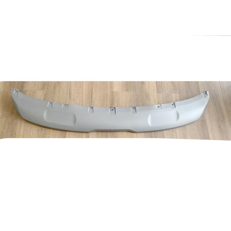 Silver front bumper trim panel.