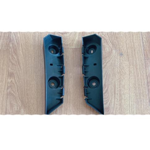 Mid-section support for the rear bumper.