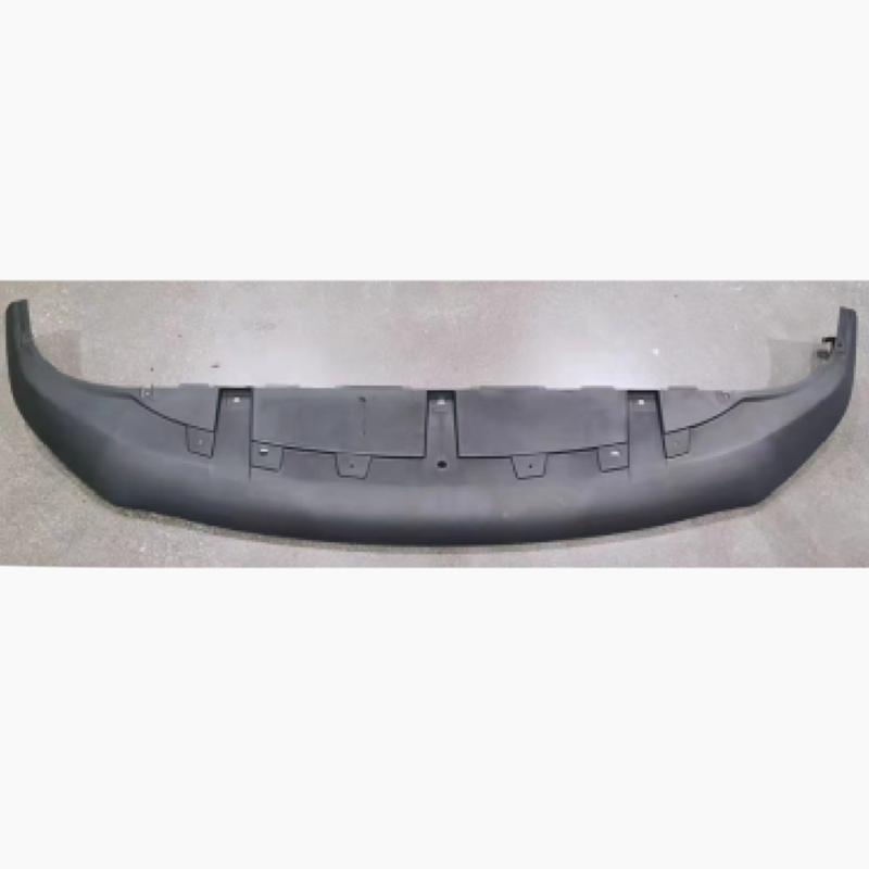 Underbody air dam under the front bumper (lower section).