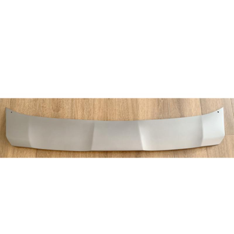 Silver front bumper trim panel.