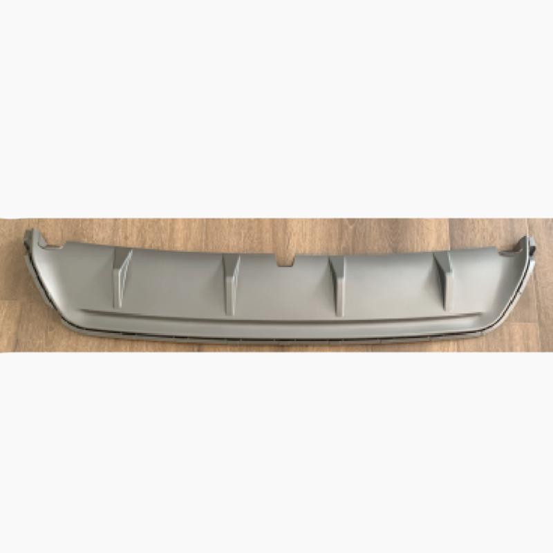 Rear bumper trim panel.