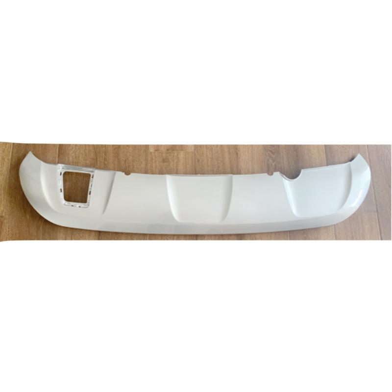 Silver rear bumper trim panel.