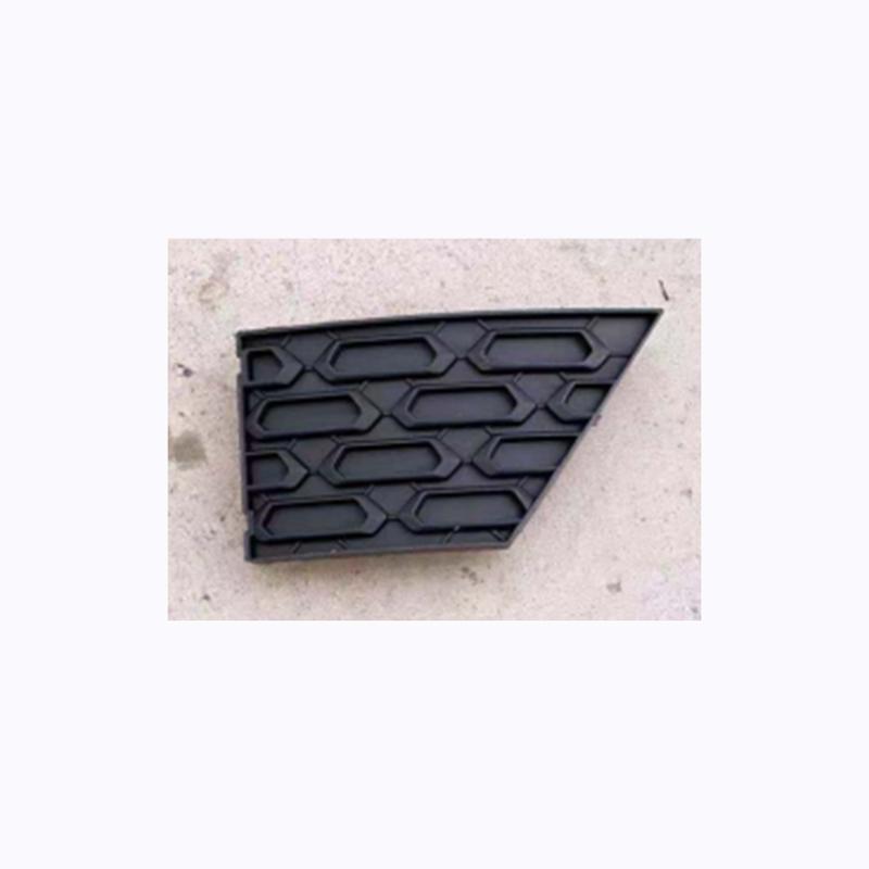 Front bumper grille with towing cover.