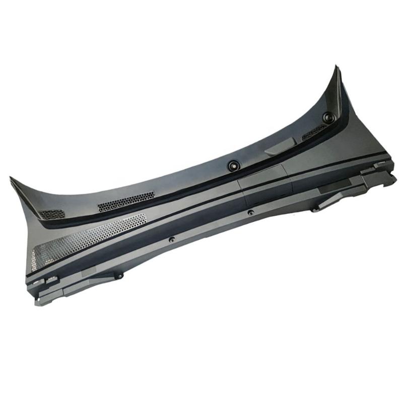 Front windshield lower trim panel