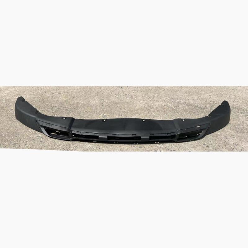 Underbody air dam under the front bumper.