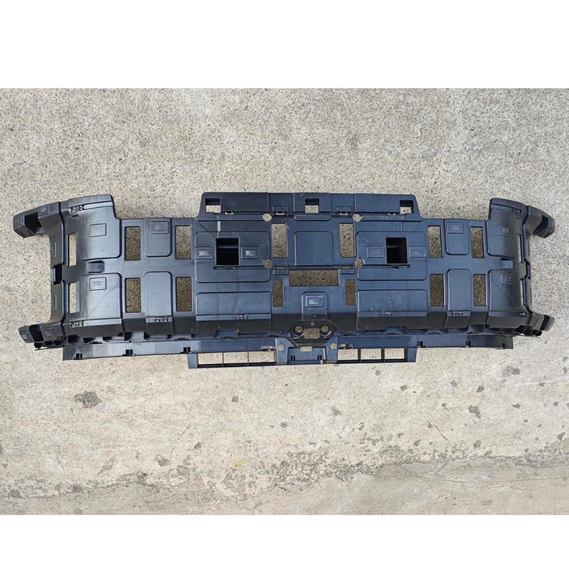 Front mid-grid support bracket.