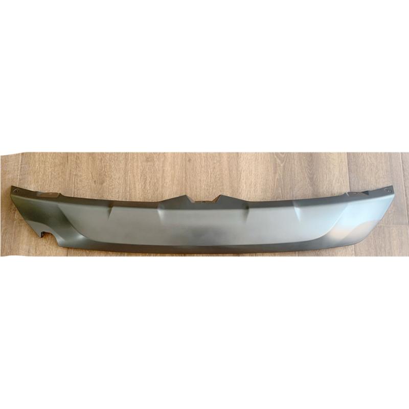 Rear bumper trim panel.