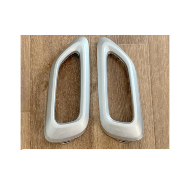 Rear exhaust pipe trim cover strip.