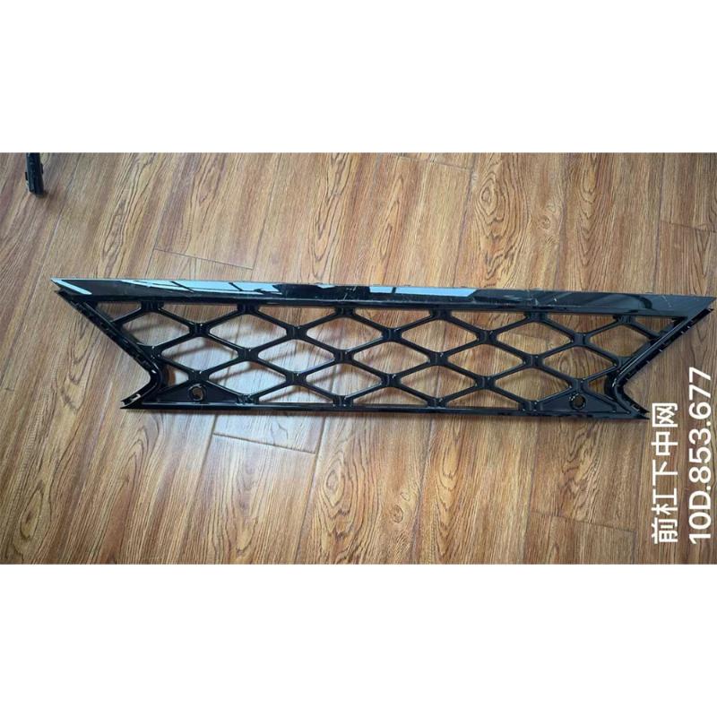 Mid-grille under the front bumper.