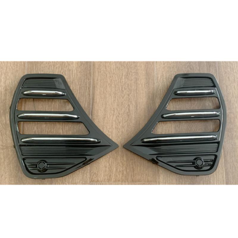 Fog light frame assembly with illuminated strips.