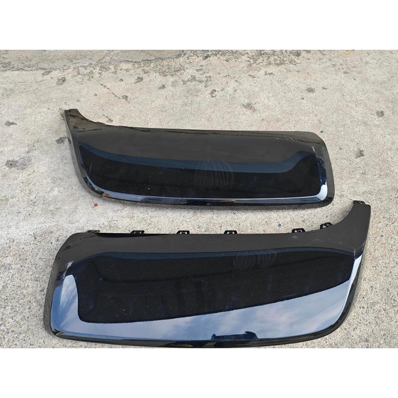 Rear bumper trim panel.