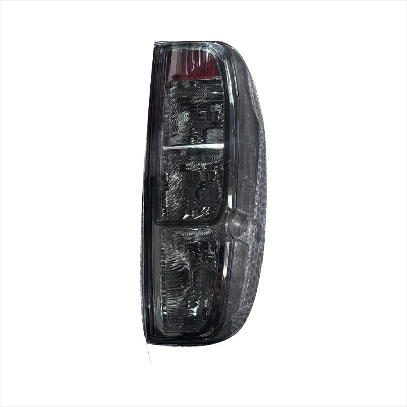 Smoked black taillight housing without light bulb.